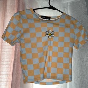 fitted light orange and blue crop top with flower, size medium, never worn